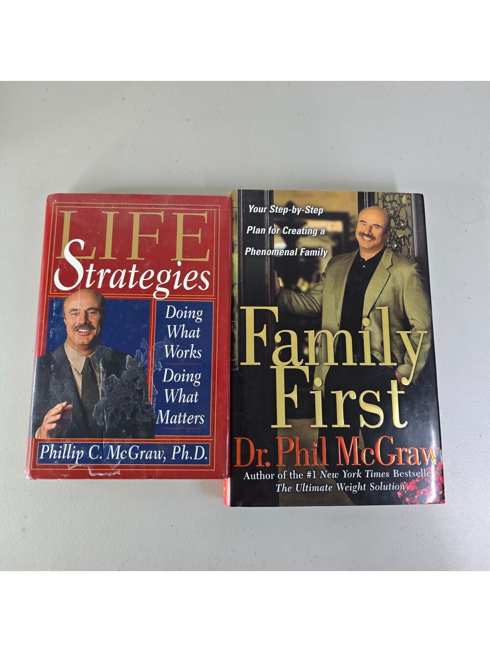 Lot of 2 Hardcover Books Life Strategies and Family First by Dr. Phil McGray